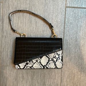 Like Dreams black and snakeskin handbag worn once in mint condition